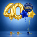 Large gold 40th birthday foil number balloons with a navy blue Happy Birthday balloon, blue and gold star-shaped foil balloons, and coordinating ribbons and balloon weights against a blue background.